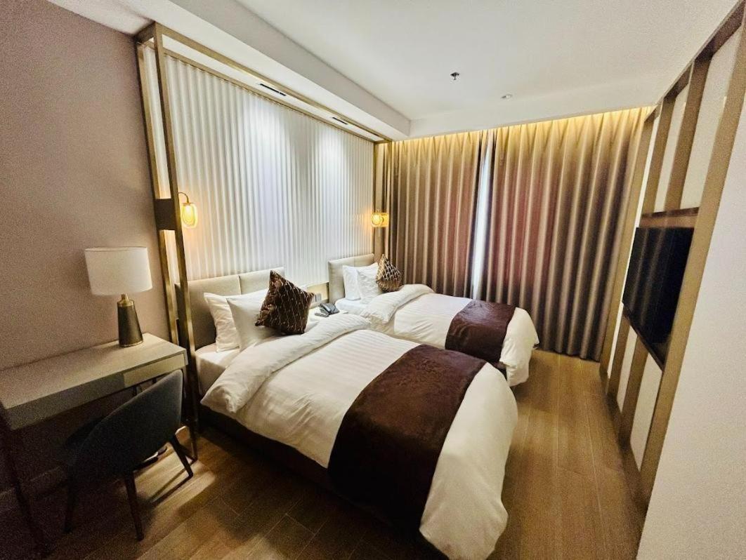 Uma Hotel And Residences Нага Номер фото